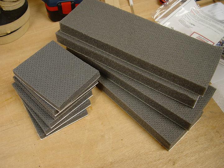 DSC02359.jpg - More fancy adhesive foam for the inside.  I cut it with a straightedge and a razor blade.